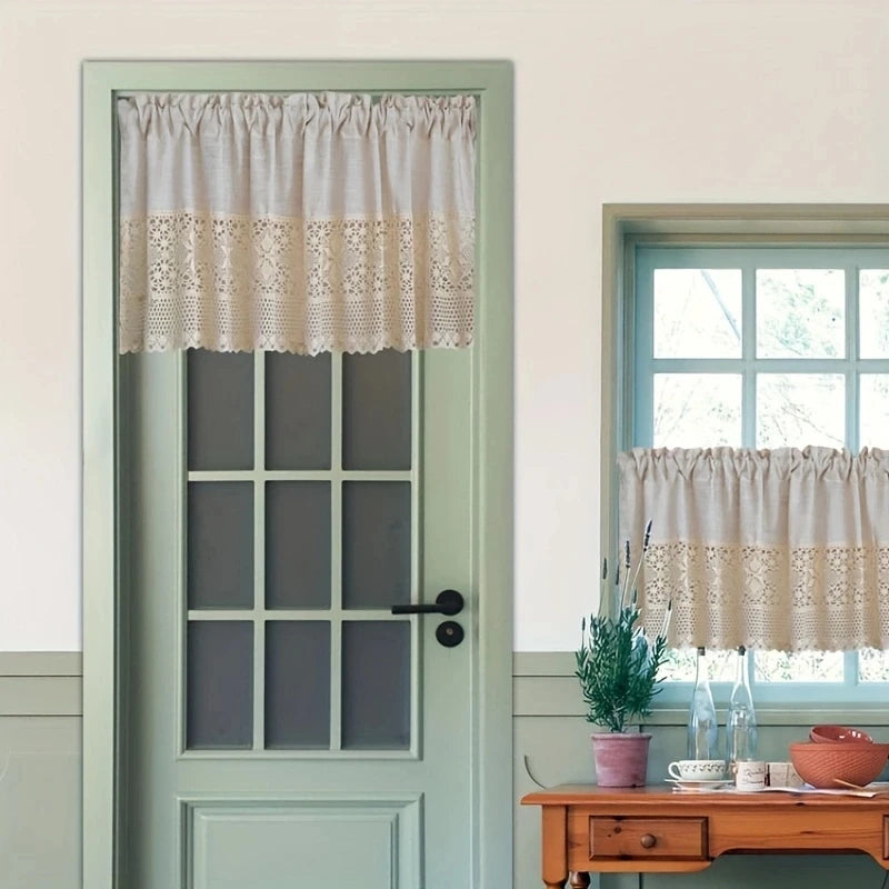 A light green door with a sheer beige crochet half curtain and a wooden dresser in the background.