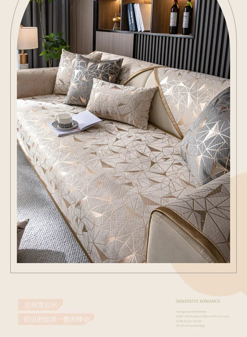 A beige luxury chenille sofa cover featuring a geometric gold pattern on a sectional sofa.