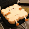 A cartoon cloud shaped seat cushion for back and fatigue relief with a light yellow color.