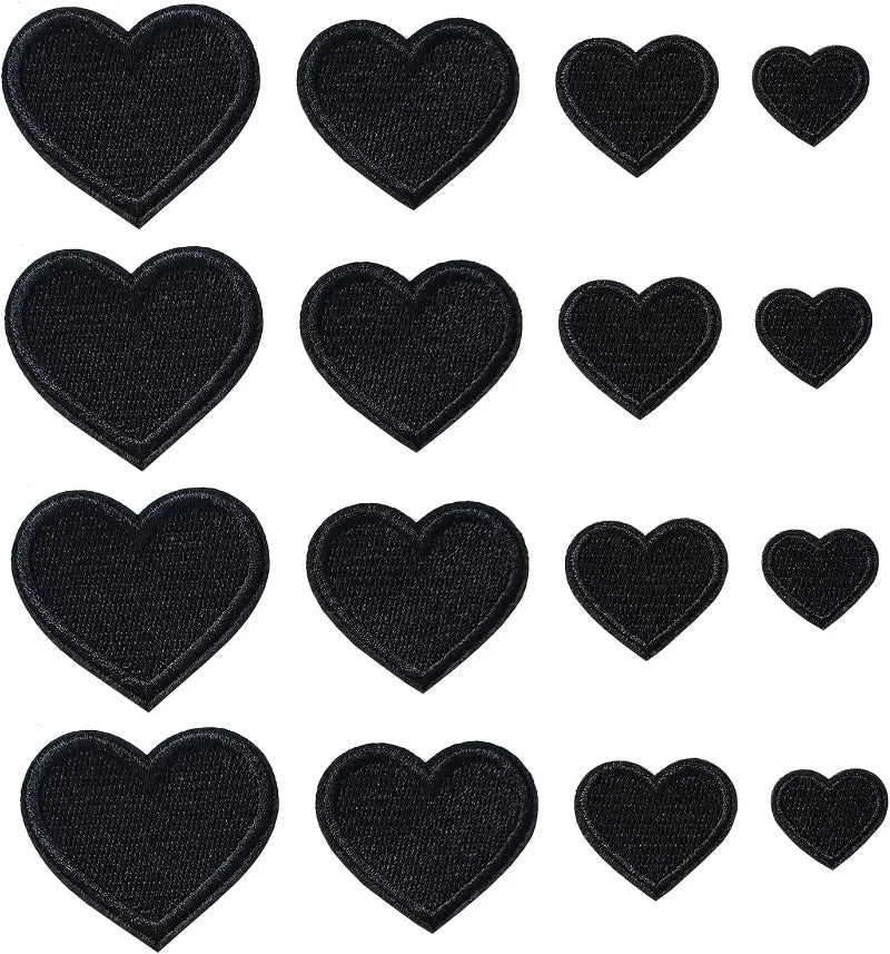 A collection of 24 black iron-on love heart embroidered patches for DIY clothing.