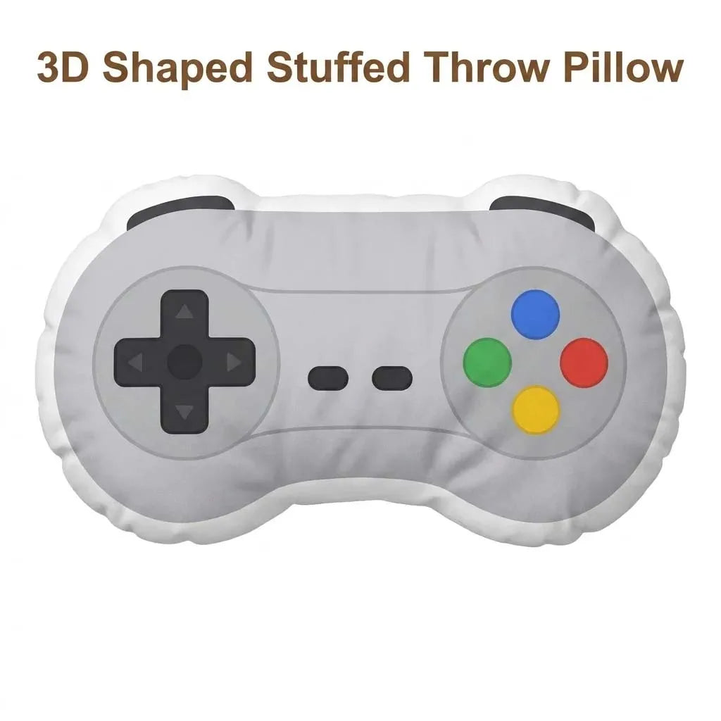 A gray 3D shaped stuffed throw pillow designed like a video game controller.