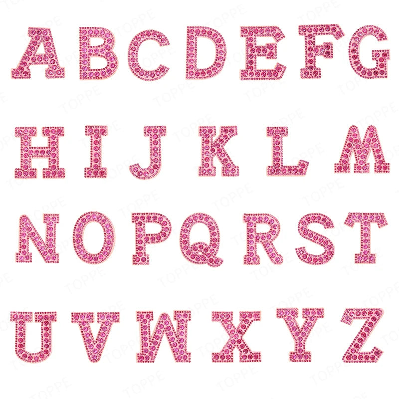 A set of pink pearl rhinestone letter patches for DIY, showing the alphabet from A to Z.