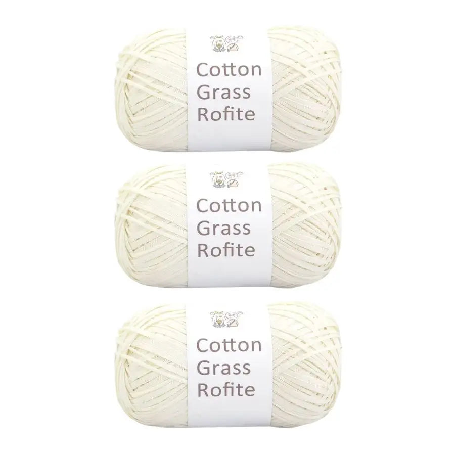 A set of white cotton grass roving yarn spools labeled Cotton Grass Rofite