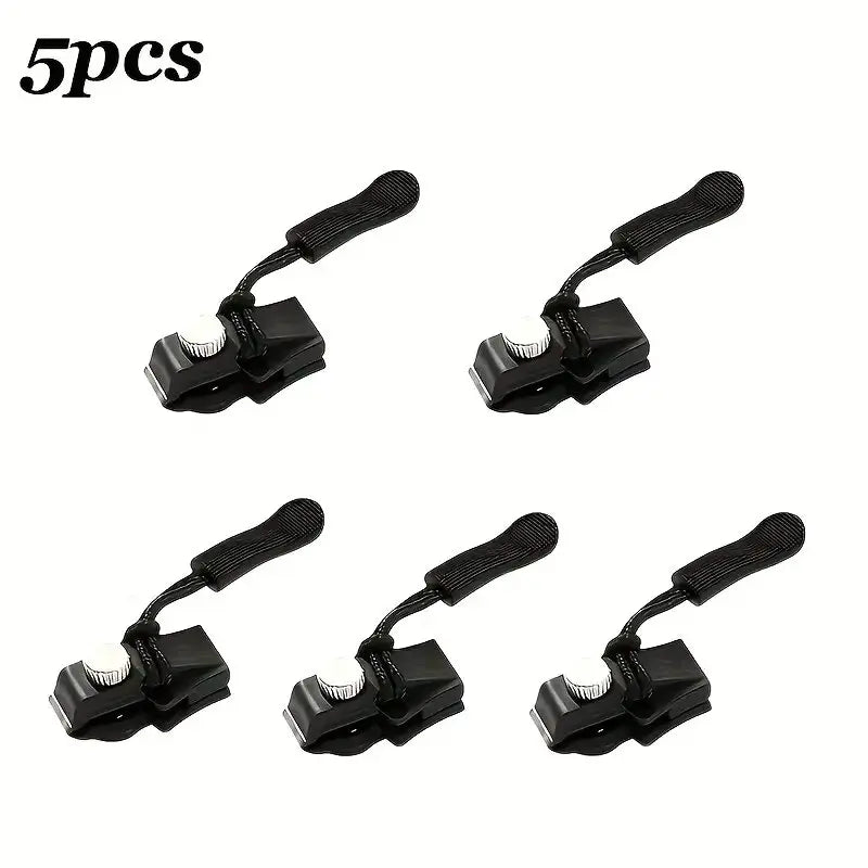 A set of five detachable zipper pulls used for repairing bags, coats, and other items.