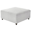 A square, white stretch jacquard ottoman and stool cover with a textured weave.