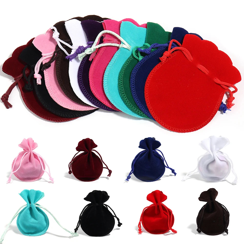 A set of ten velvet drawstring gift bags in various colors including pink, purple, green, blue, and red.