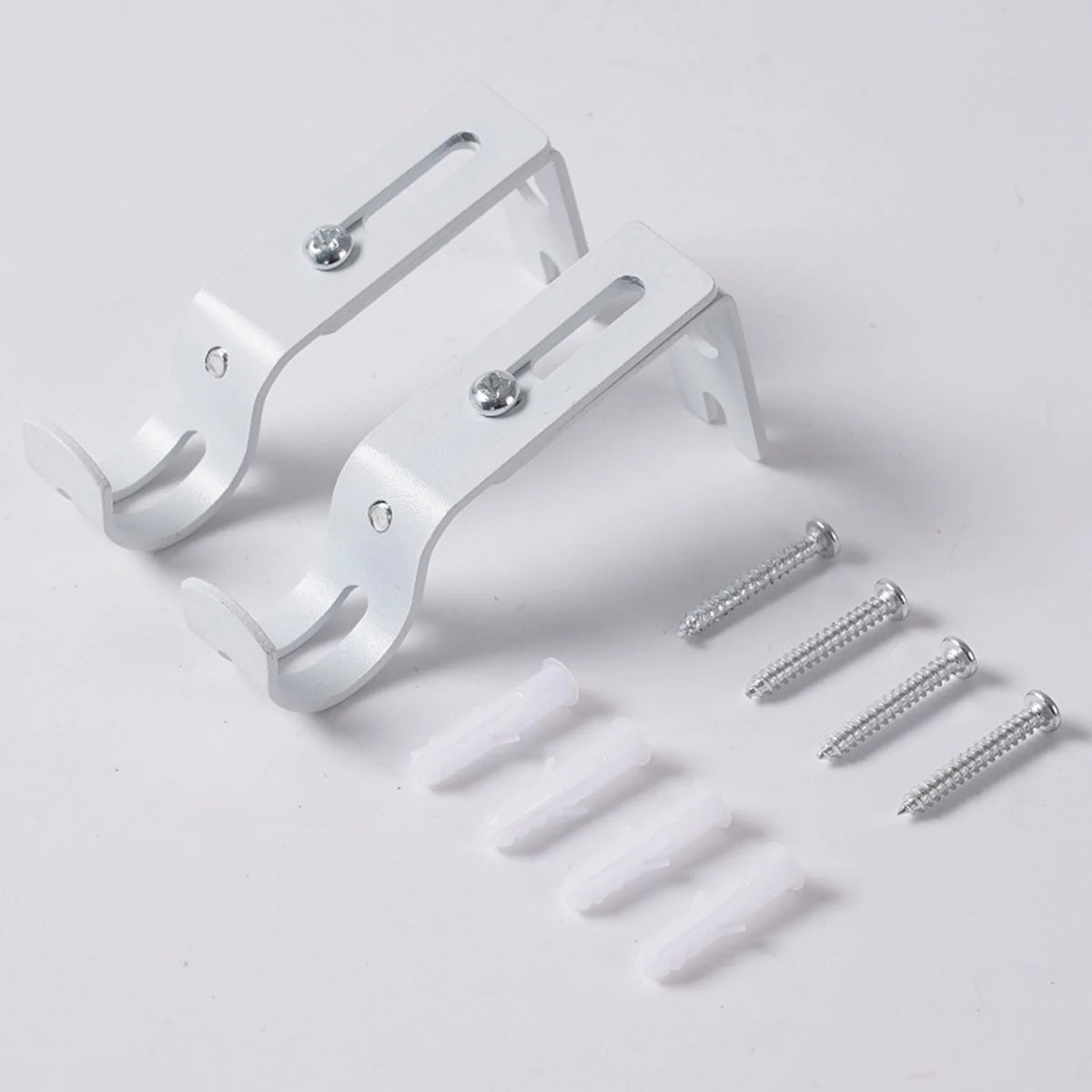 A white adjustable iron curtain rod rack with mounting brackets and threaded rods.