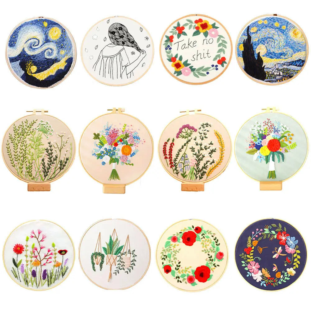 A collection of colorful floral cross stitch embroidery designs on circular fabric pieces.
