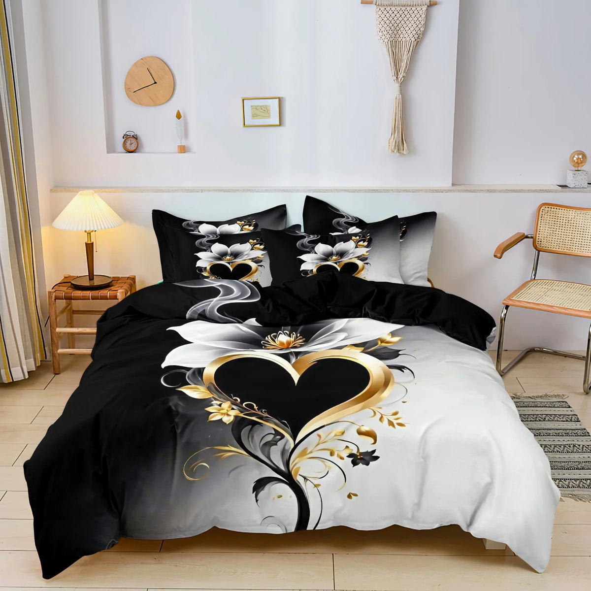 Black and white duvet cover featuring a romantic floral design with gold scroll accents.