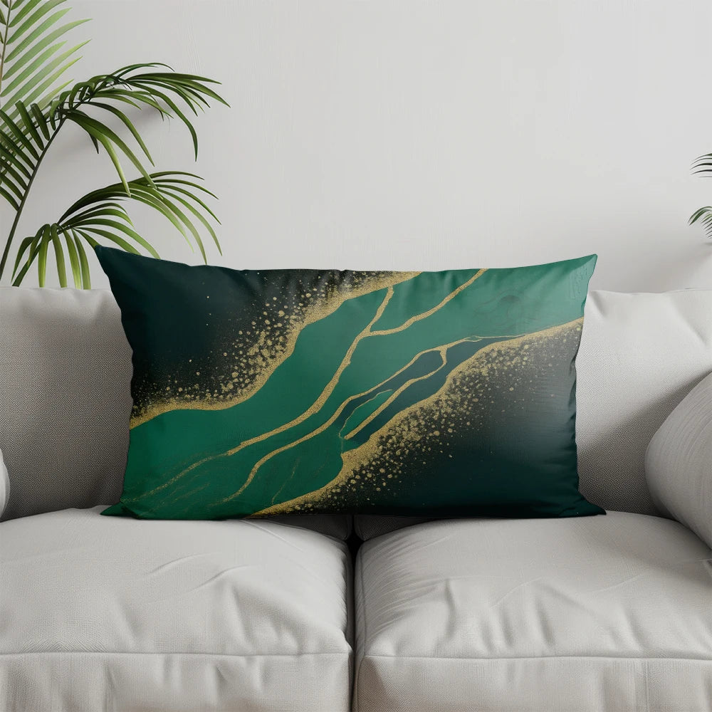 A dark teal pillow cover featuring a flowing geometric pattern of bright green and gold lines.
