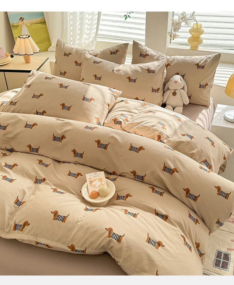 A beige duvet set featuring a cute dog print pattern on the fabric.