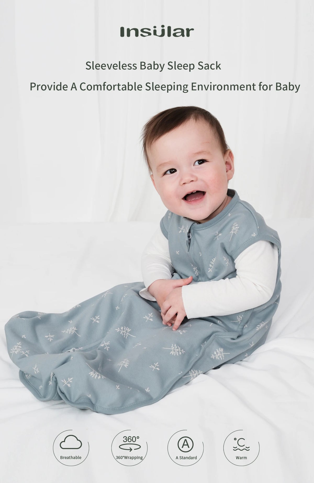 A baby wearing a light blue sleeveless sleep sack for sleeping on a white bed.