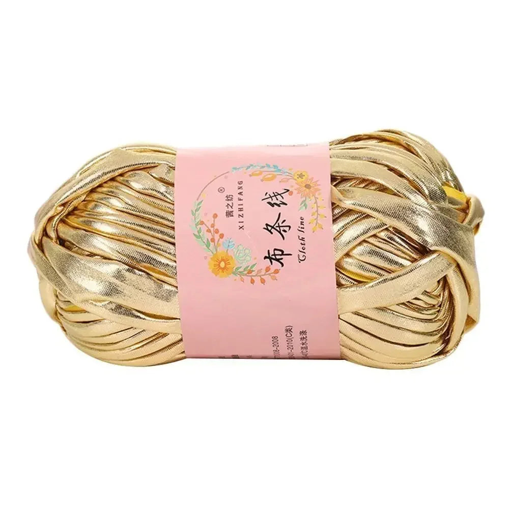 Spool of gold colored 3mm ice rope crochet yarn for crafting