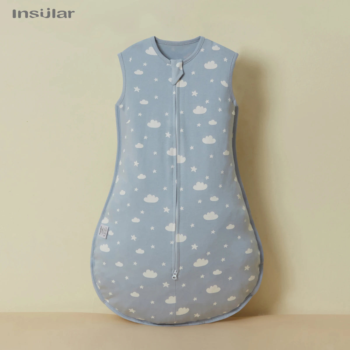 Light blue cotton sleep sack for baby or toddler with a white cloud pattern