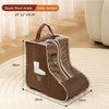 A brown portable boot storage bag with a carry handle is shown on a light rug.
