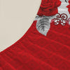 A red floral patterned fitted mattress cover featuring a large rose and leaf design.