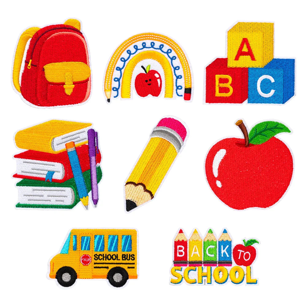 A set of iron-on decorative patches featuring letters A, B, C, and a school bus graphic.