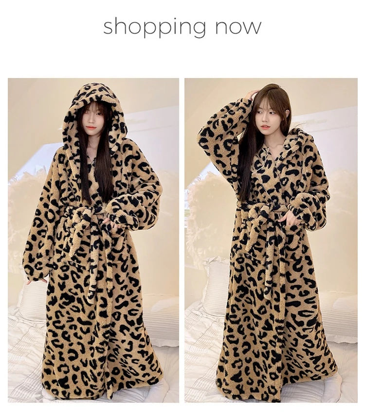 A woman models a long, patterned leopard print flannel kimono robe indoors.