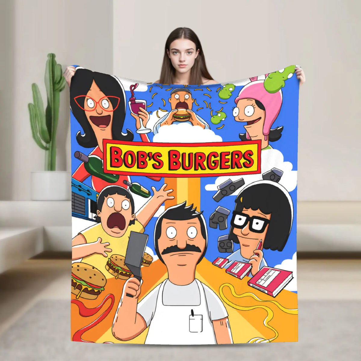 A colorful throw blanket featuring characters from Bob's Burgers in a cartoon style.