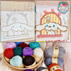 A collection of soft milk cotton knitting yarn in various colors and textures displayed in a woven basket.
