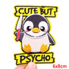 Yellow embroidered patch featuring a cute penguin with text above and below