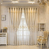 Elegant cream dual-layer blackout curtains with eyelet tops framing a window in a bright room.