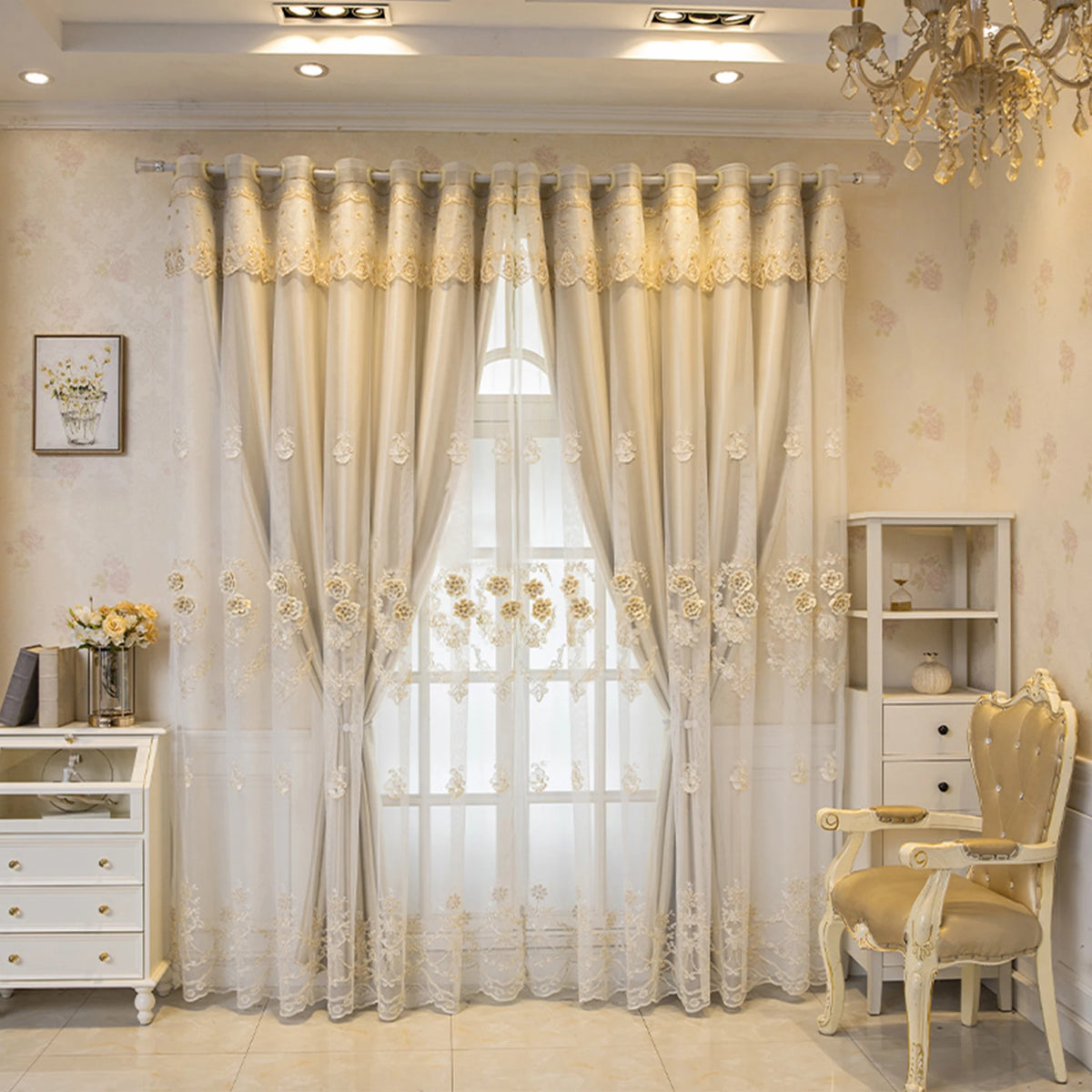 Elegant cream dual-layer blackout curtains with eyelet tops framing a window in a bright room.