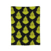 A pattern of yellow-green, owl-like faces on a dark background for a plush coral fleece throw blanket.