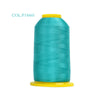 A spool of teal polyester embroidery thread with a yellow core.