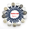 A circular arrangement of five silver and bronze buttons used as adjustable waistbands or pant waist expanders.