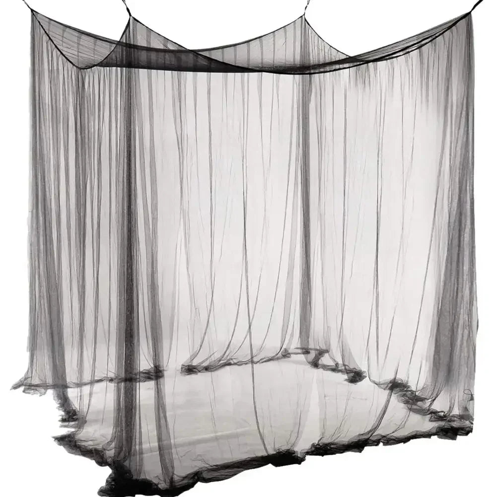 A sheer black mosquito net canopy draped over a frame, suggesting a bed enclosure.