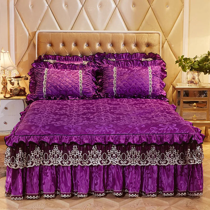 A purple bed skirt set featuring a ruffled fabric and matching pillowcases on a bed with a tufted headboard.