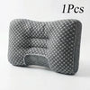 A gray ergonomic pillow with a honeycomb pattern is shown on a white background.