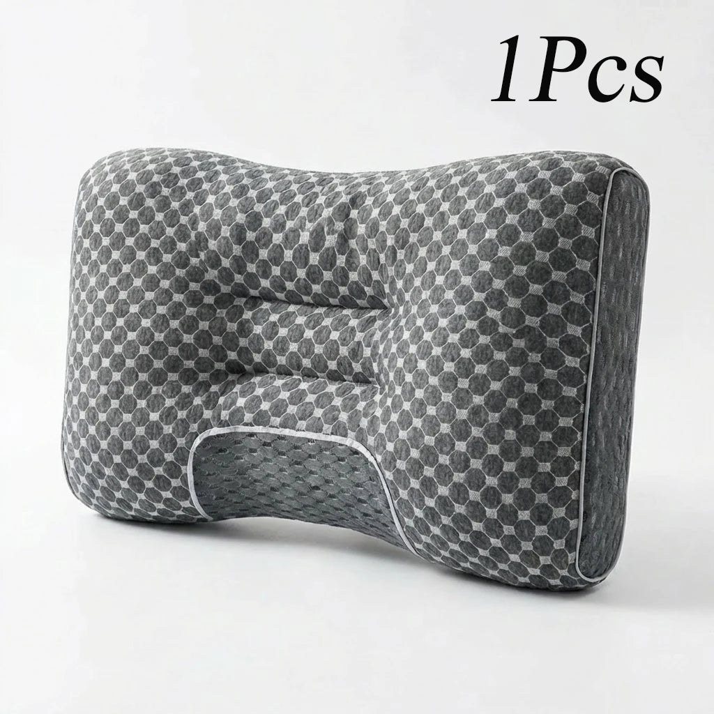 A gray ergonomic pillow with a honeycomb pattern is shown on a white background.