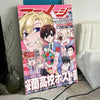 Poster for Ouran High School Host Club featuring anime characters and artwork