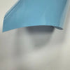 A light blue heat transfer vinyl sheet is shown angled against a white background.