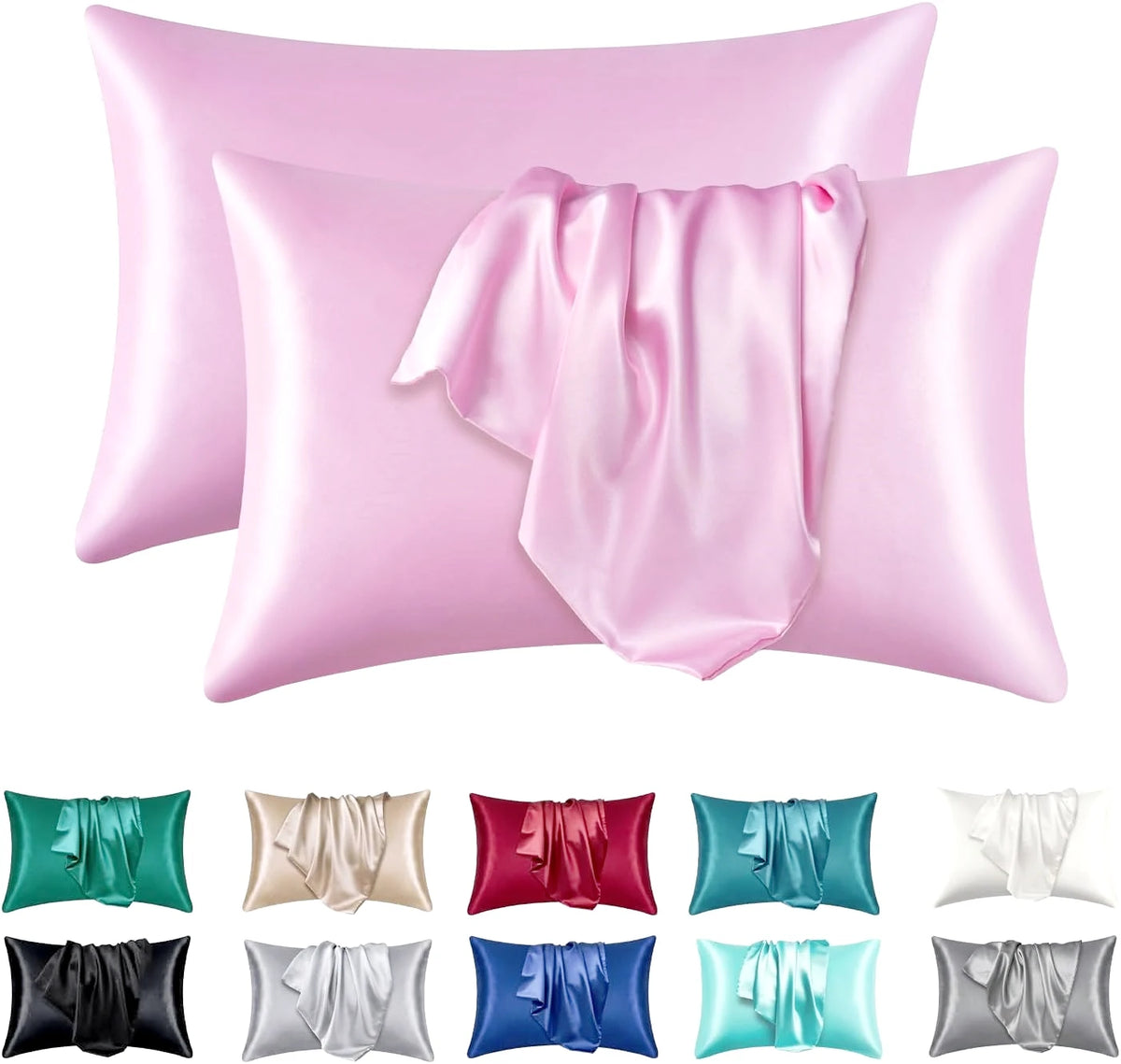 A set of pink satin pillowcases, including a main pillow and several folded fabric samples in various colors like green, beig