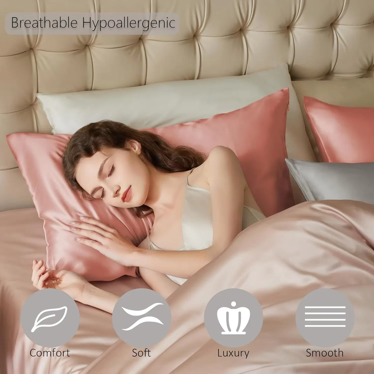 A woman rests on a pink silk pillow, demonstrating comfort and luxury in a bedroom setting.
