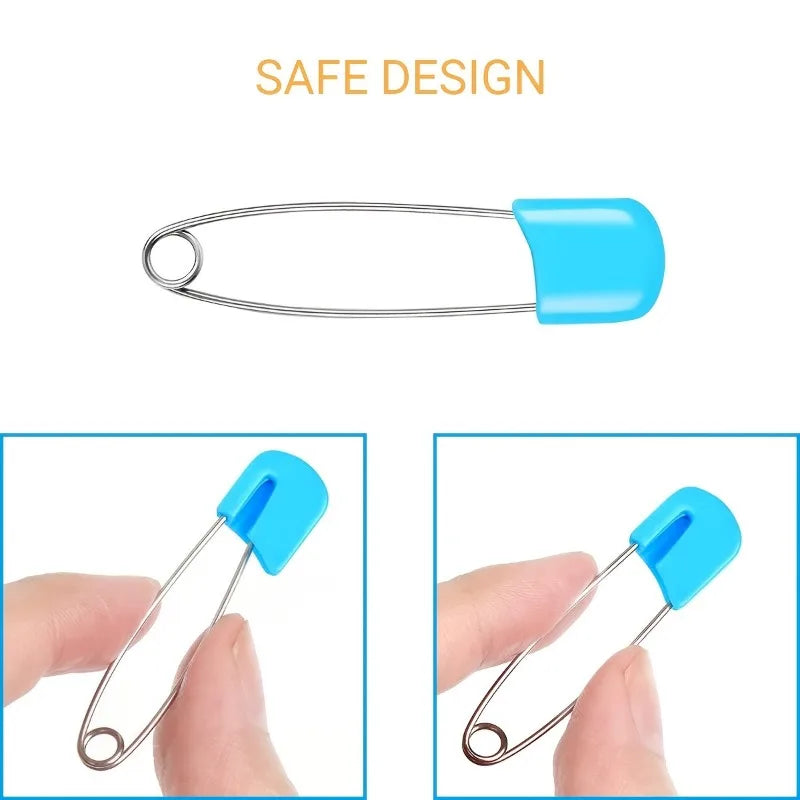 A close-up view of a stainless steel diaper pin with a blue safety locking closure.