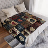 A cozy heart-print flannel throw blanket folded on a white bed with light pillows.