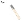 A pair of stainless steel sewing and embroidery scissors shown in a light beige or cream color.