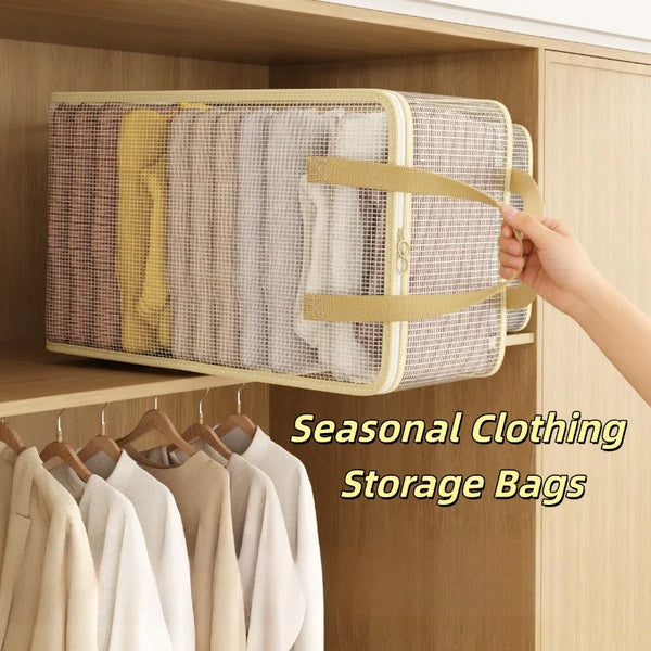 A hand is pulling out a beige mesh storage bag filled with folded clothing from a wooden cabinet shelf.