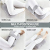 Ergonomic knee pillow shown in various positions under a leg, between legs, and under a calf for versatile use.