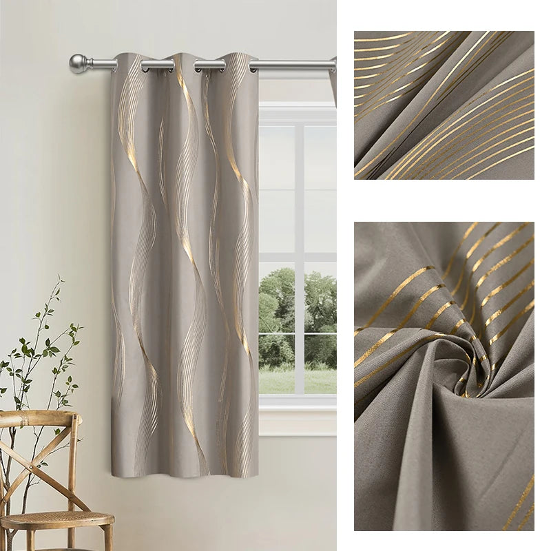 Elegant gray blackout curtains with a golden wave pattern hanging on a rod.