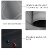 Close-up view of a dark gray technical leather mat with a rubber antiskid sole and a black interior lining.