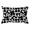 A decorative pillow cover featuring a black and white floral geometric pattern.