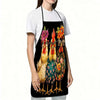 A woman wearing a black apron with a funny chicken floral print and glasses over a white t-shirt.