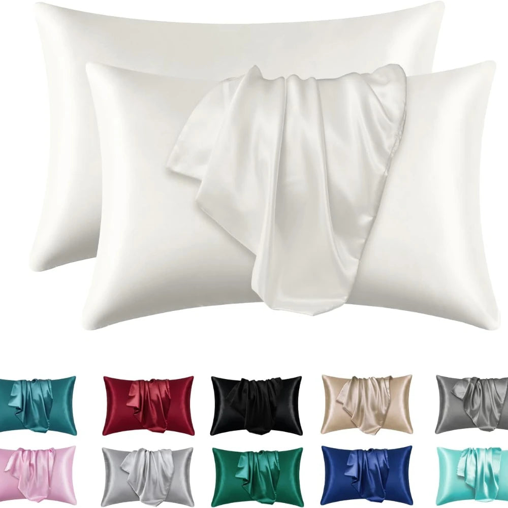 A collection of satin silk pillow covers in various colors including green, pink, purple, red, black, silver, and blue.