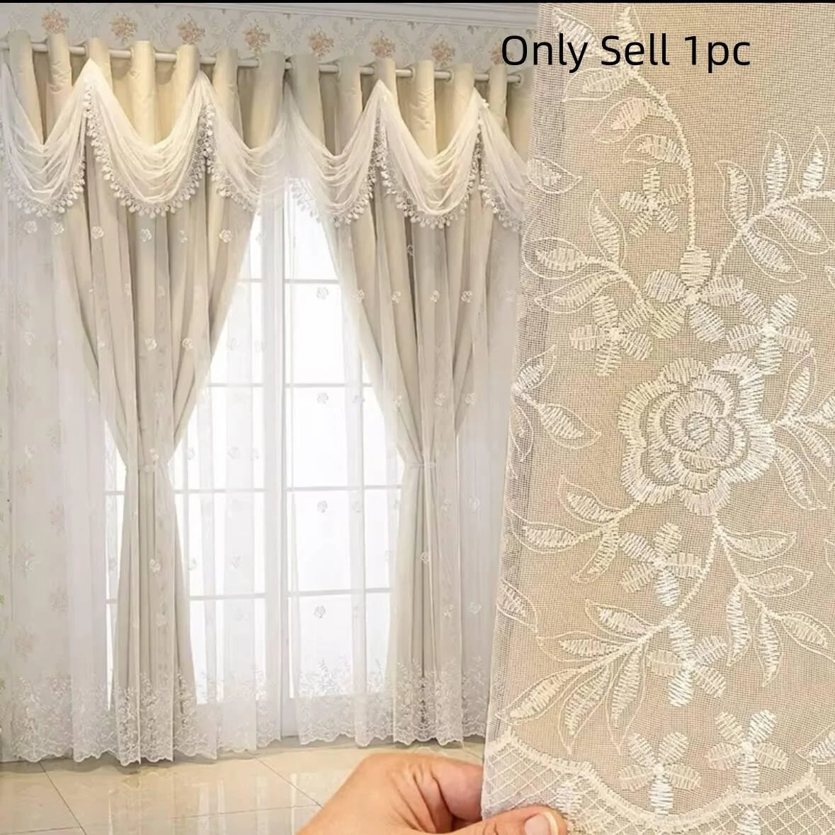 A close-up of a sheer white and beige dual-layer embroidered window curtain with decorative fringe and lace detailing.