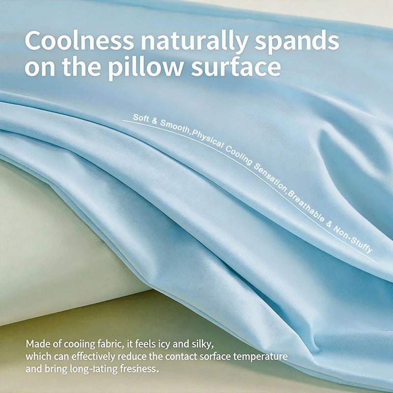 Light blue silk fabric draped, showing a cooling sensation on the pillow surface.